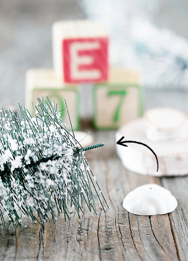 Turn the base of a bottle brush or sisal tree from drab to fab with this simple Christmas Tree Craft inspiration. Learn more at livelaughrowe.com