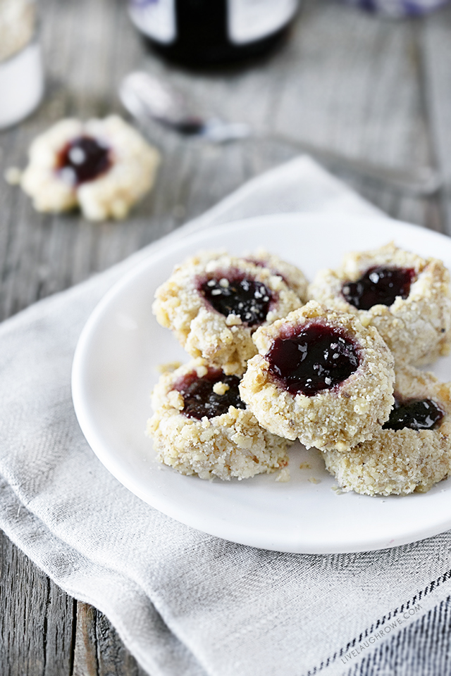 These thumbprint cookies are delicious, buttery little cookies filled with jam and rolled in nuts. This Thumbprint Cookie Recipe is not only a sweet treat, it's also incredibly easy to make. Recipe at livelaughrowe.com