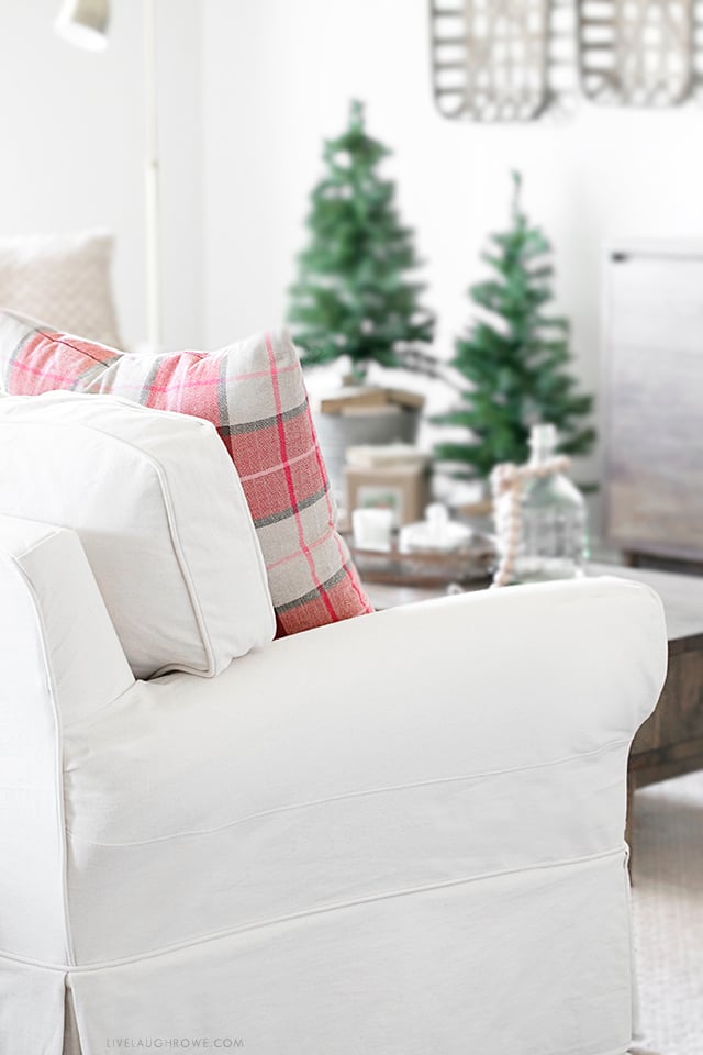 Simple Modern Farmhouse Living Room Holiday Makeover. Take a look at some of these beautiful pieces purchased from the Home Depot. Learn more at livelaughrowe.com (sp)