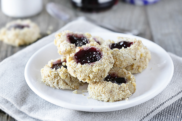These thumbprint cookies are delicious, buttery little cookies filled with jam and rolled in nuts. This Thumbprint Cookie Recipe is not only a sweet treat, it's also incredibly easy to make. Recipe at livelaughrowe.com