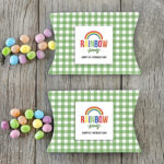 A darling St. Patrick's Day Gift Idea with a free rainbow printable and green gingham pillow box! Grab yours at livelaughrowe.com