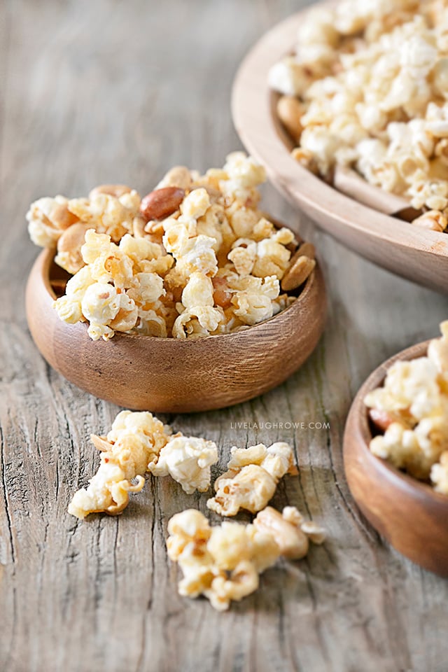 This homemade popcorn recipe is the bomb-diggity! If you enjoy a sweet and salty popcorn treat, then this might just be a new favorite. Did I mention it's super easy to make too?!? Recipe at livelaughrowe.com #sweetandsalty #popcornrecipe #snack #peanuts