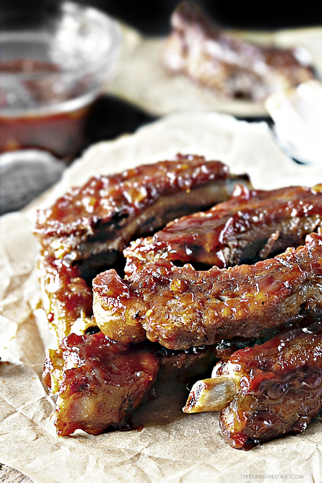 Forget the hamburgs and hot dogs, these Sweet BBQ Oven Baked Baby Back Ribs are sure to be the star of the show! Baking them in the oven keeps them simple — and the sauce is perfection. Recipe at livelaughrowe.com