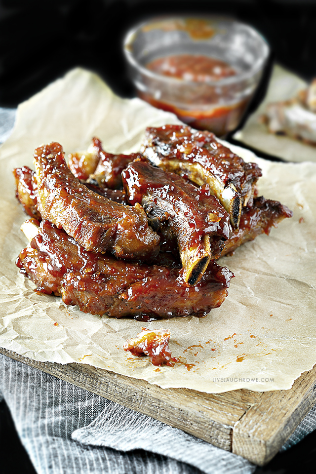 Forget the hamburgs and hot dogs, these Sweet BBQ Oven Baked Baby Back Ribs are sure to be the star of the show! Baking them in the oven keeps them simple — and the sauce is perfection. Recipe at livelaughrowe.com