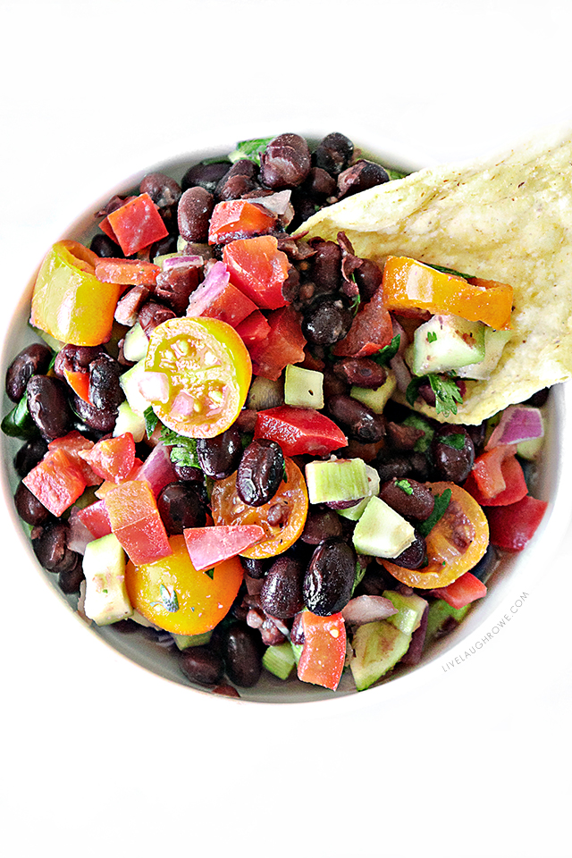 A delicious chunky-style Black Bean Salsa recipe that is made with fresh ingredients. Forget the store brands! Impress your friends and family with this flavorful salsa you can whip up in less than 20 minutes,. Recipe at livelaughrowe.com