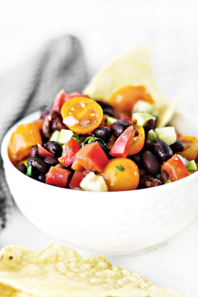 A delicious chunky-style Black Bean Salsa recipe that is made with fresh ingredients. Forget the store brands! Impress your friends and family with this flavorful salsa you can whip up in less than 20 minutes,. Recipe at livelaughrowe.com