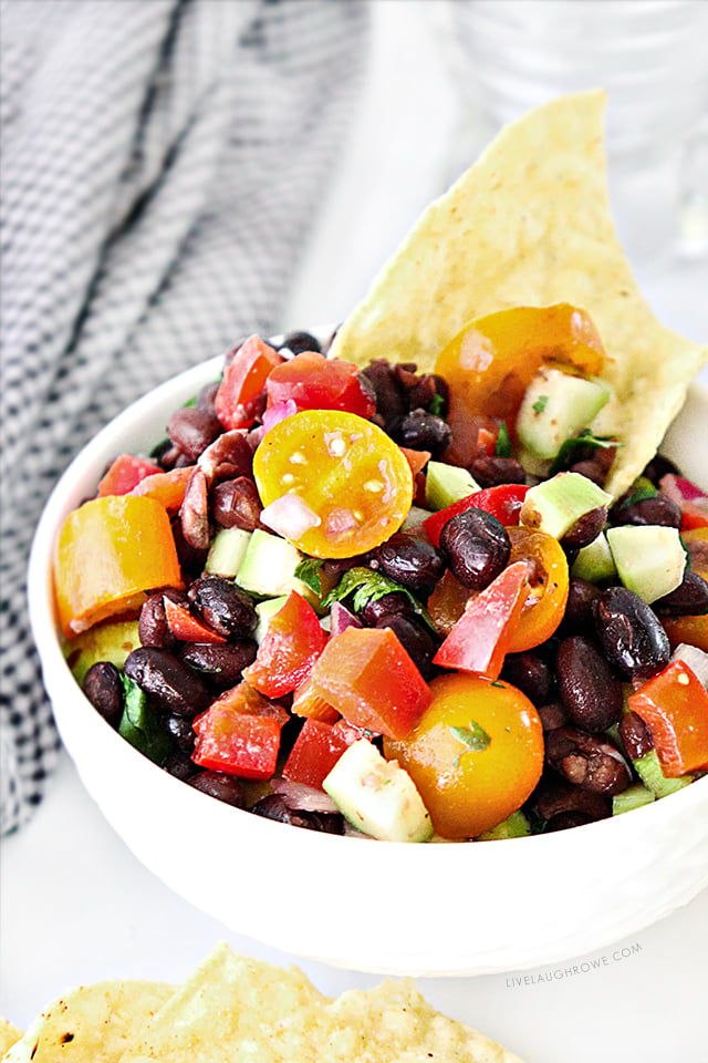 A delicious chunky-style Black Bean Salsa recipe that is made with fresh ingredients. Forget the store brands! Impress your friends and family with this flavorful salsa you can whip up in less than 20 minutes,. Recipe at livelaughrowe.com