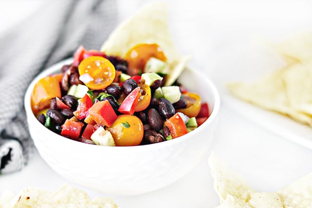 A delicious chunky-style Black Bean Salsa recipe that is made with fresh ingredients. Forget the store brands! Impress your friends and family with this flavorful salsa you can whip up in less than 20 minutes,. Recipe at livelaughrowe.com