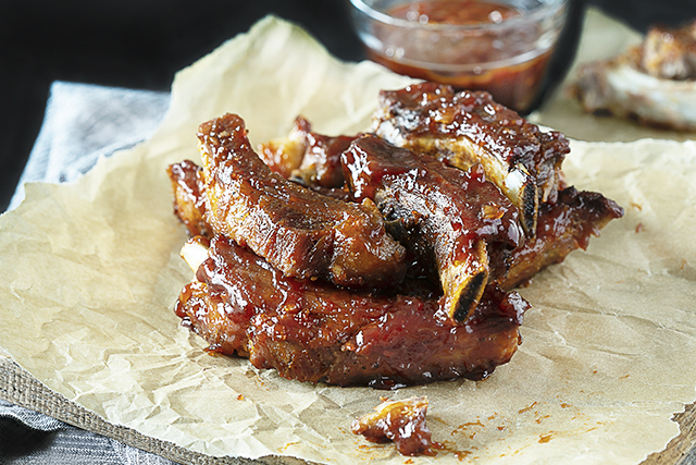Forget the hamburgs and hot dogs, these Sweet BBQ Oven Baked Baby Back Ribs are sure to be the star of the show! Baking them in the oven keeps them simple — and the sauce is perfection. Recipe at livelaughrowe.com