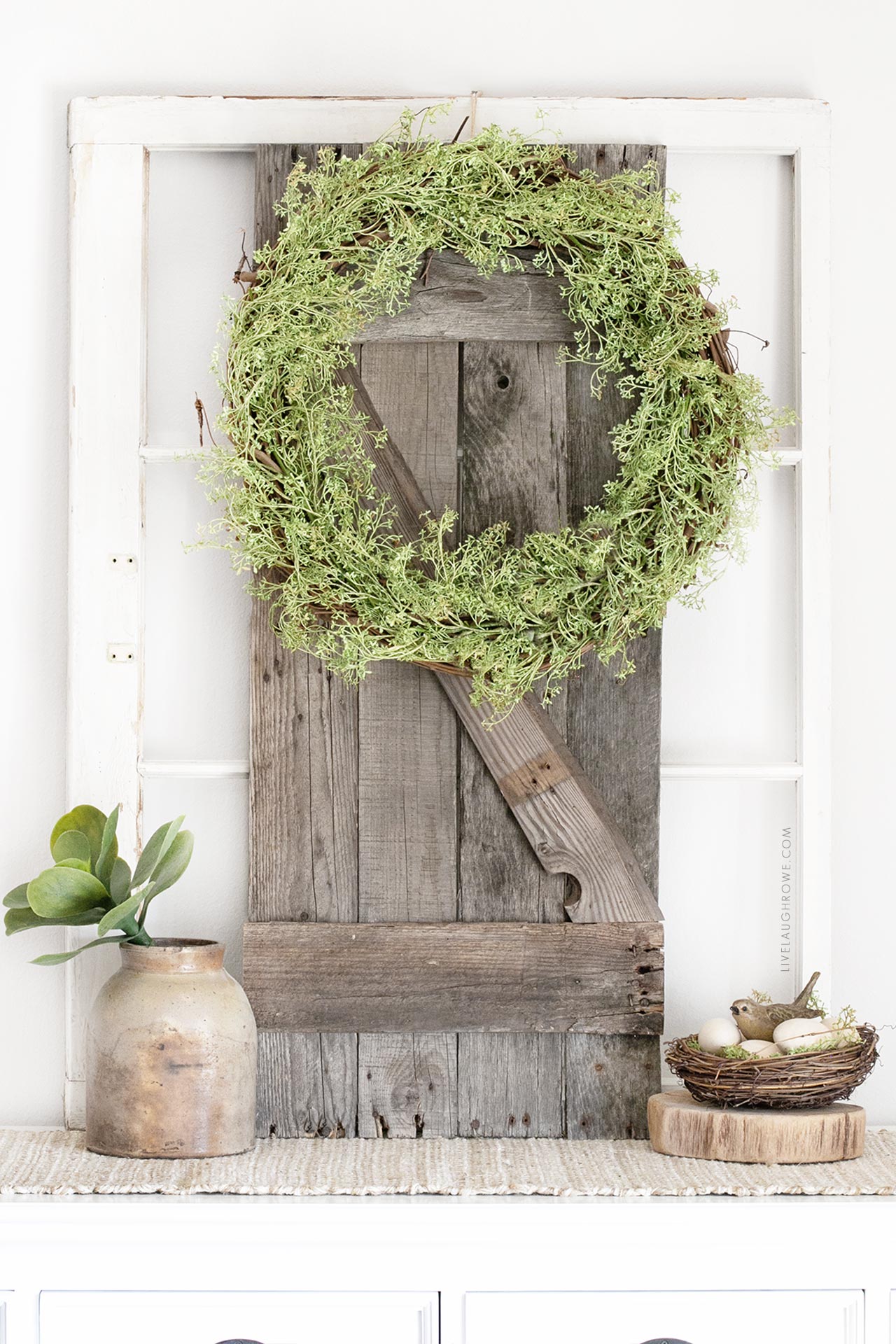 Garland Wreath hanging on Pallet Wood Shutter