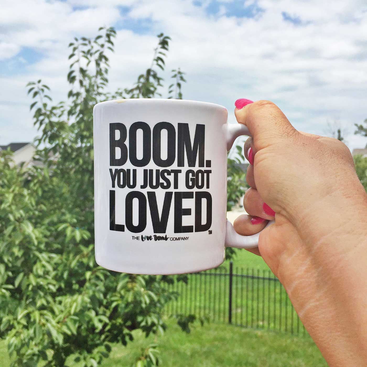 Boom!  You just got loved coffee mug being held in the air.