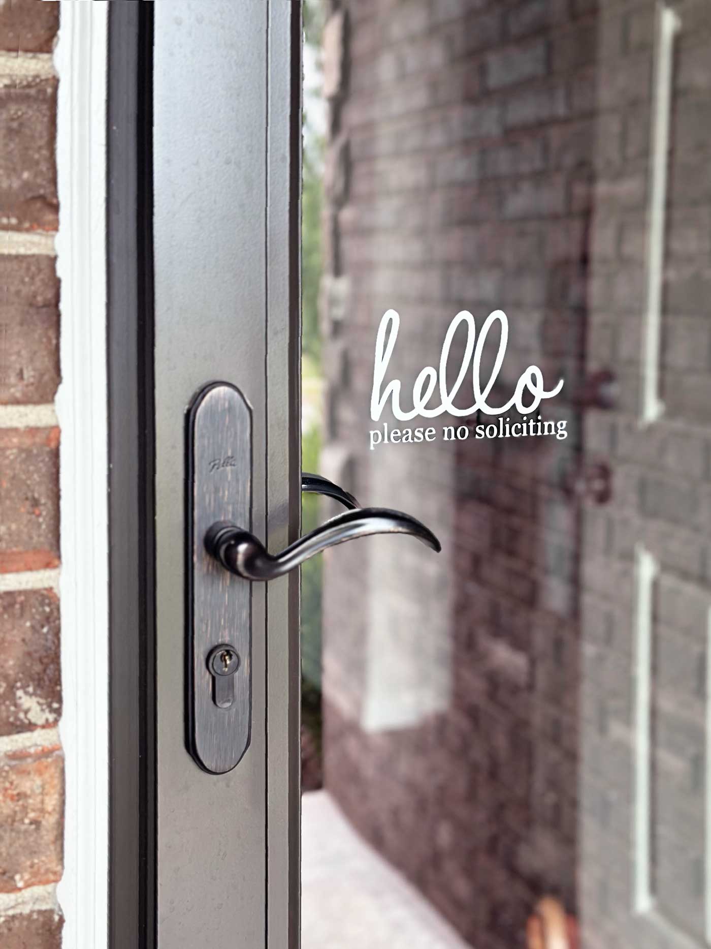 hello no soliciting decal on storm door