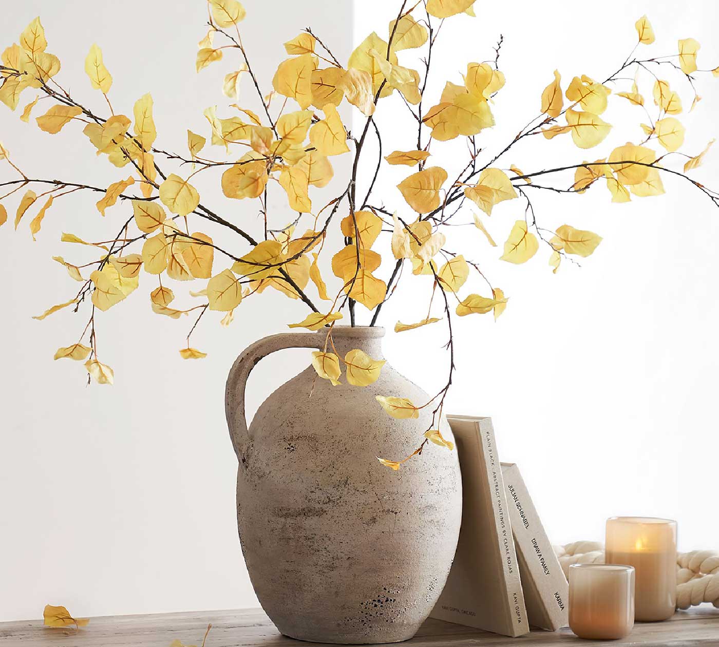 faux aspen stems in a large vase