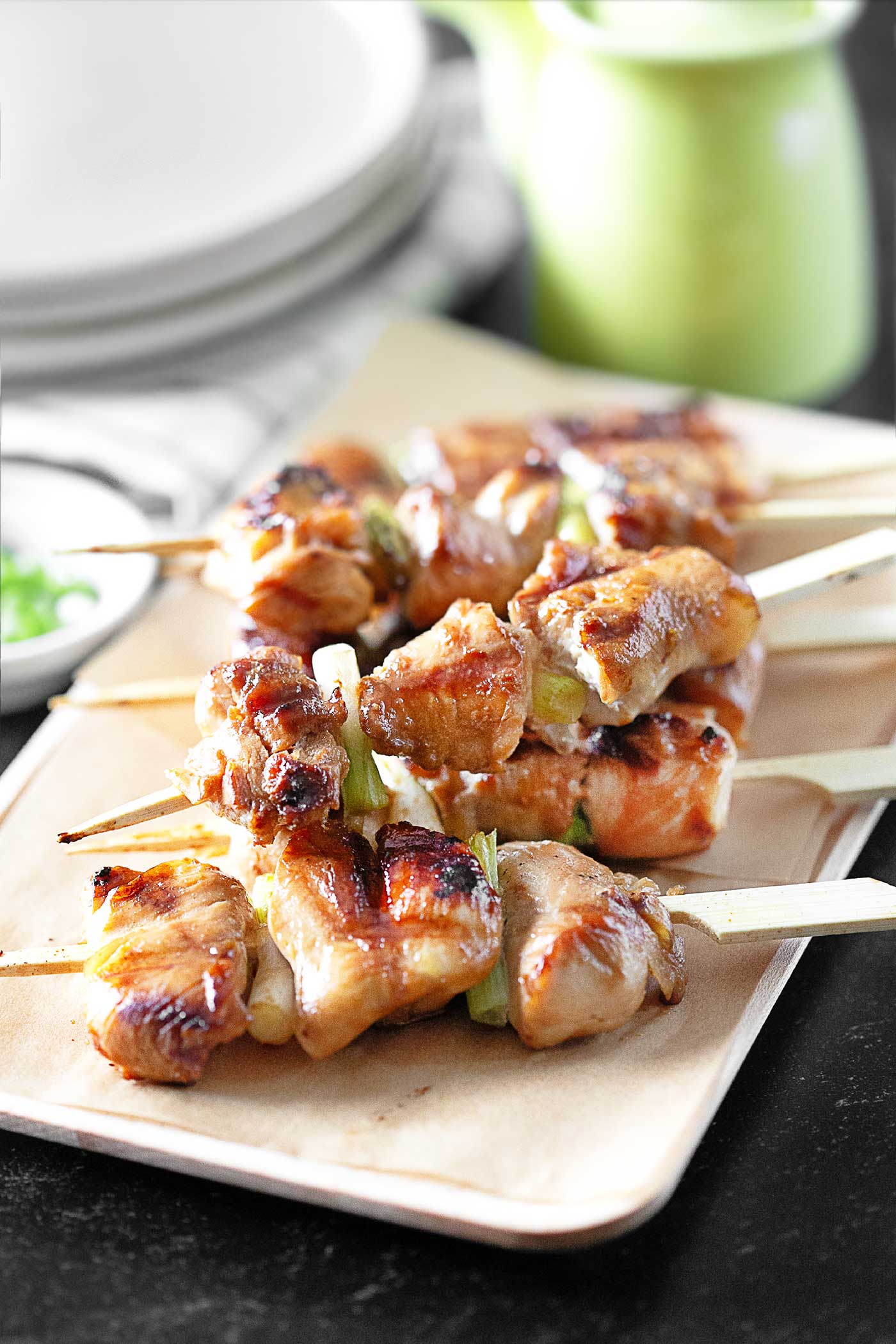 Skewers stacked on plate