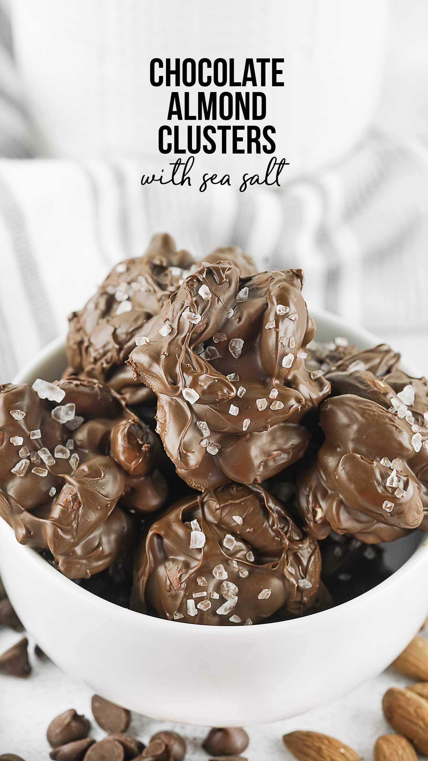 chocolate almond clusters stacked in a bowl