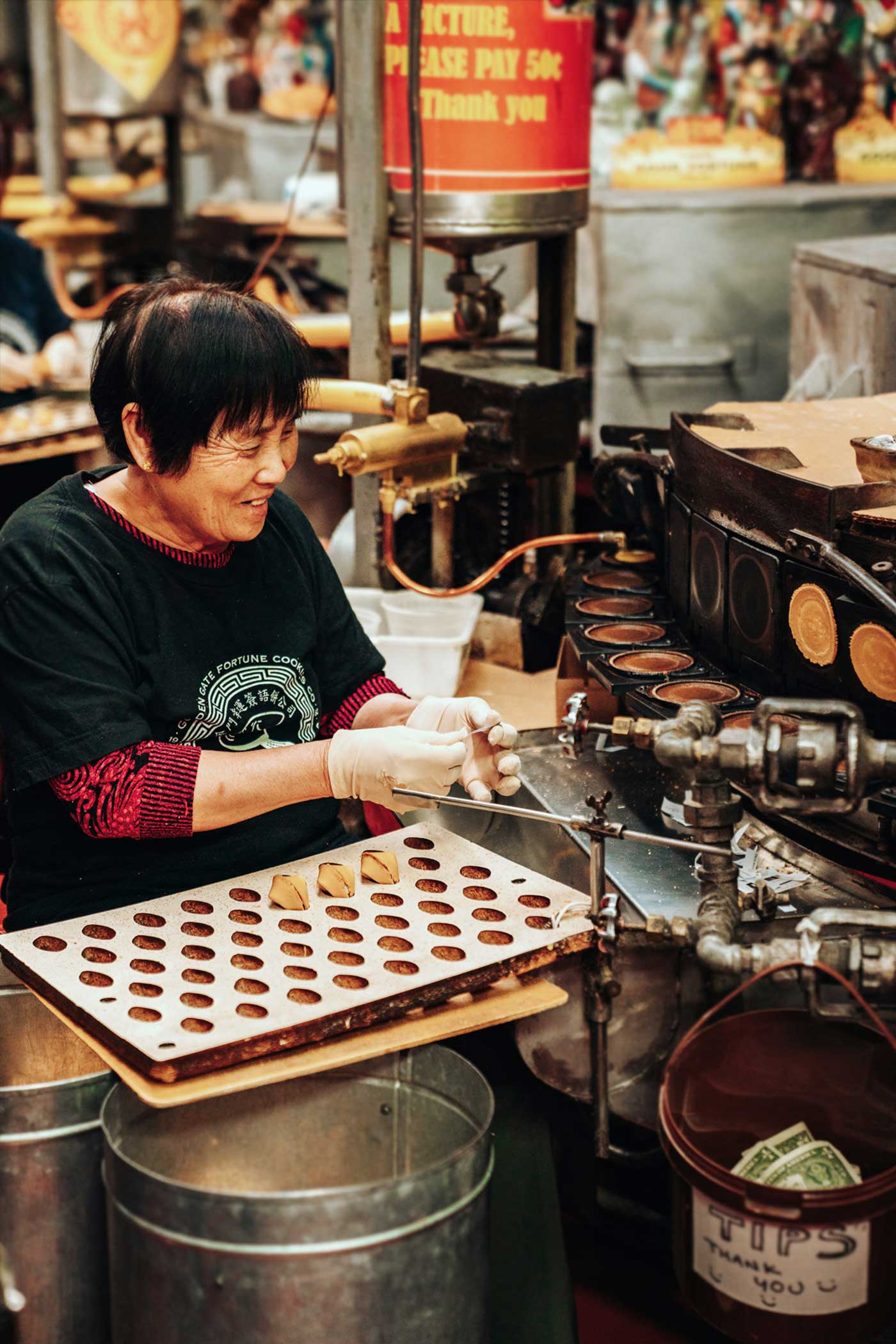 woman making fortune cookies