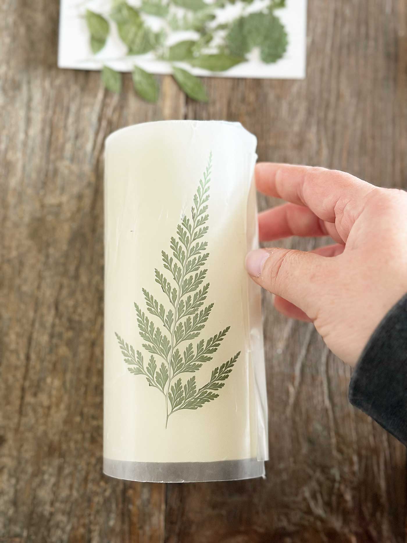 wrapping wax paper around pillar candle
