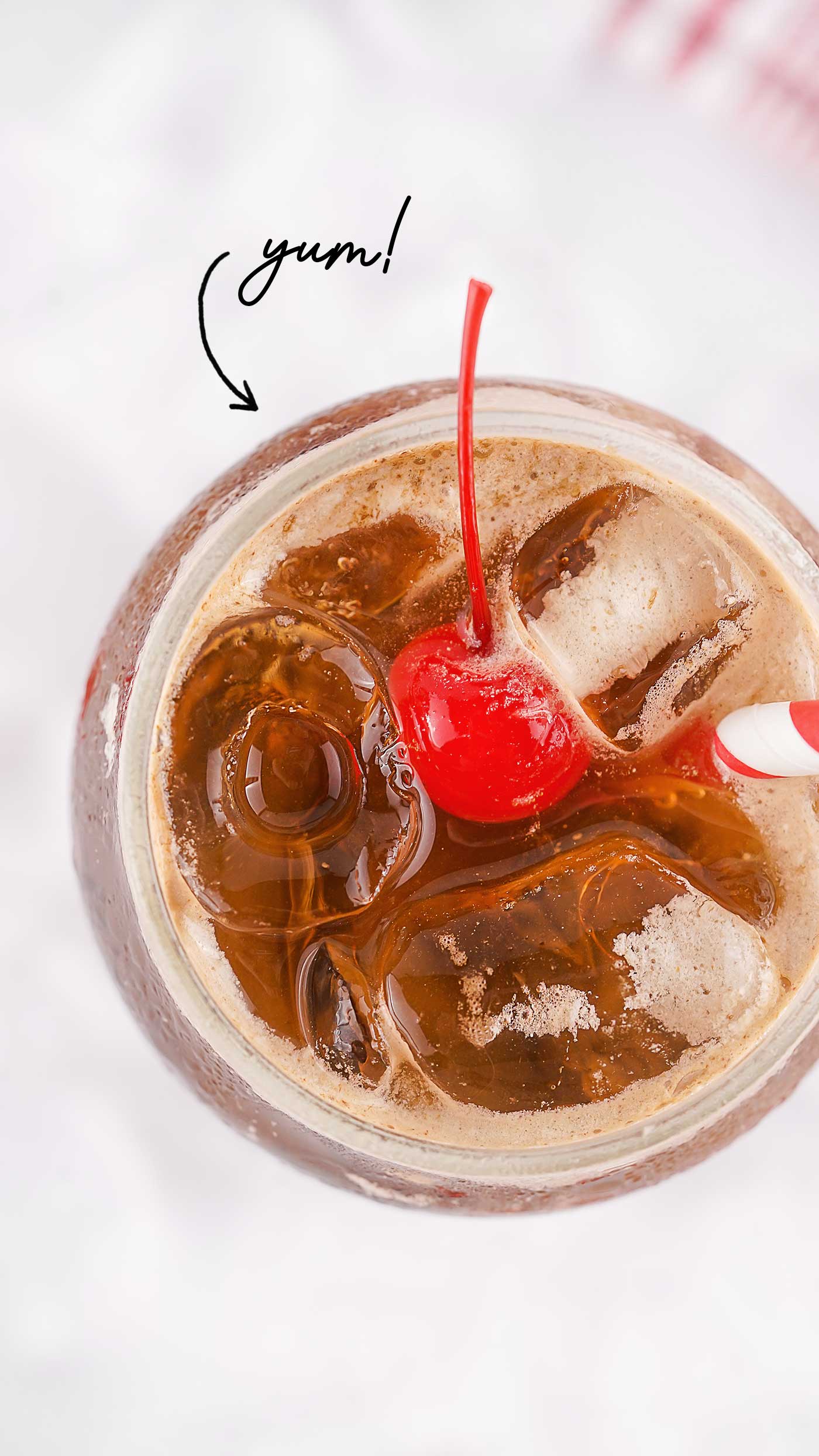 looking down into a glass with coke and fluff