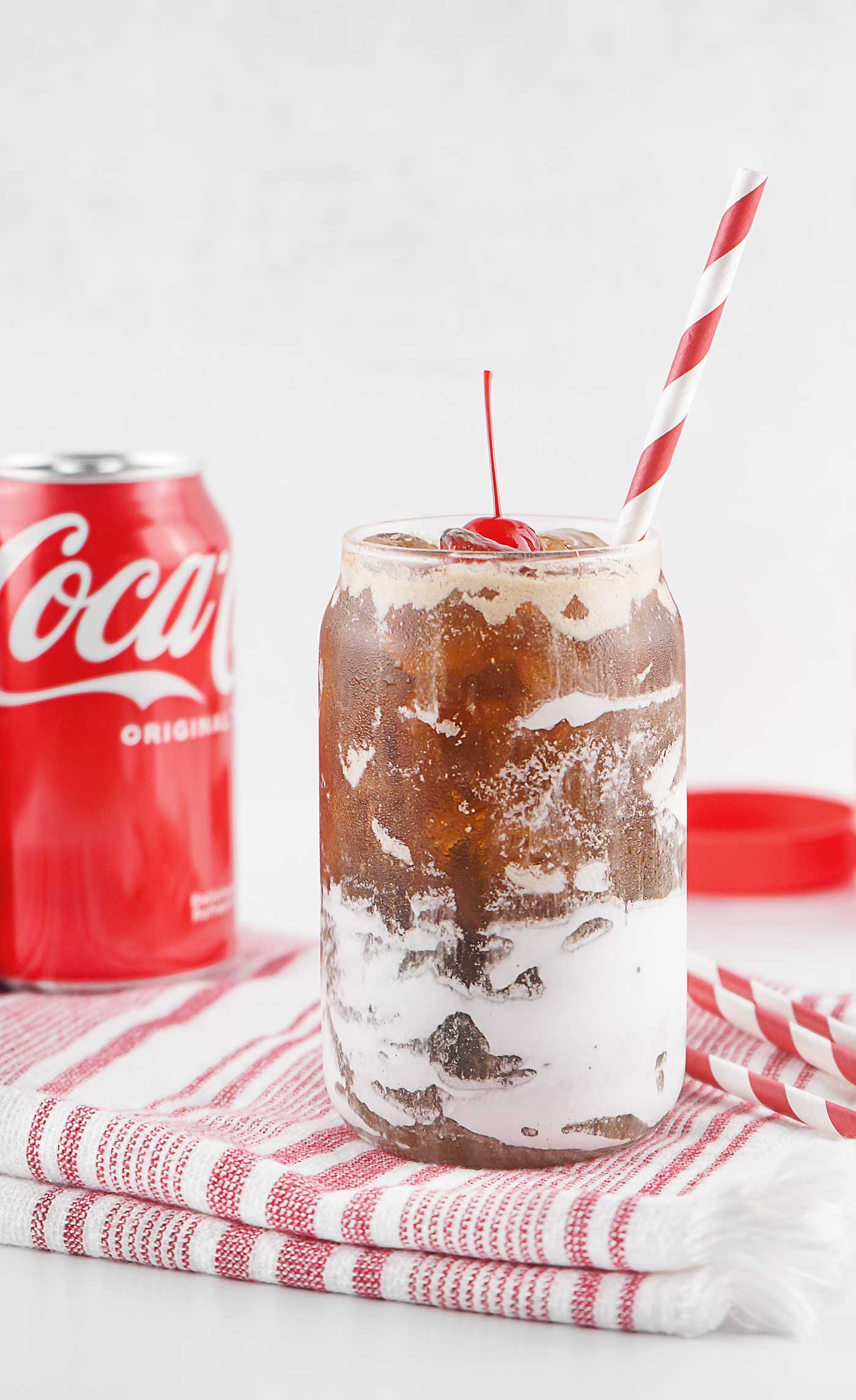 Marshmallow Coke Drink sitting on a towl