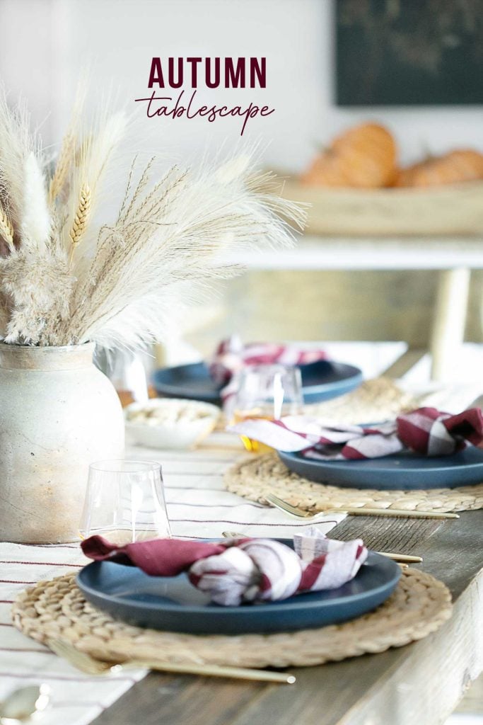 lovely tablescape set for fall using navy and burgundy