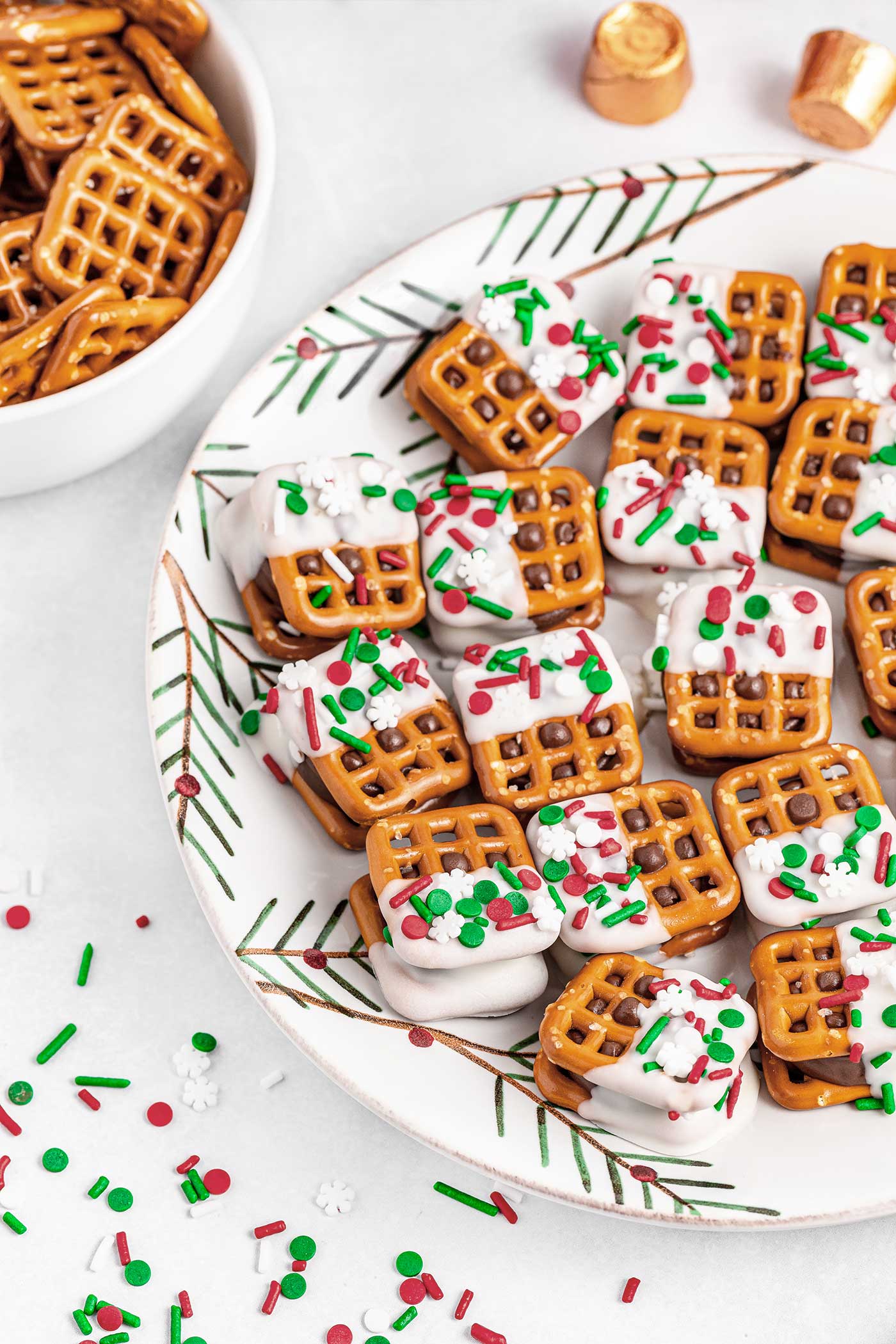 festive rolo pretzel sandwiches on a holiday plate