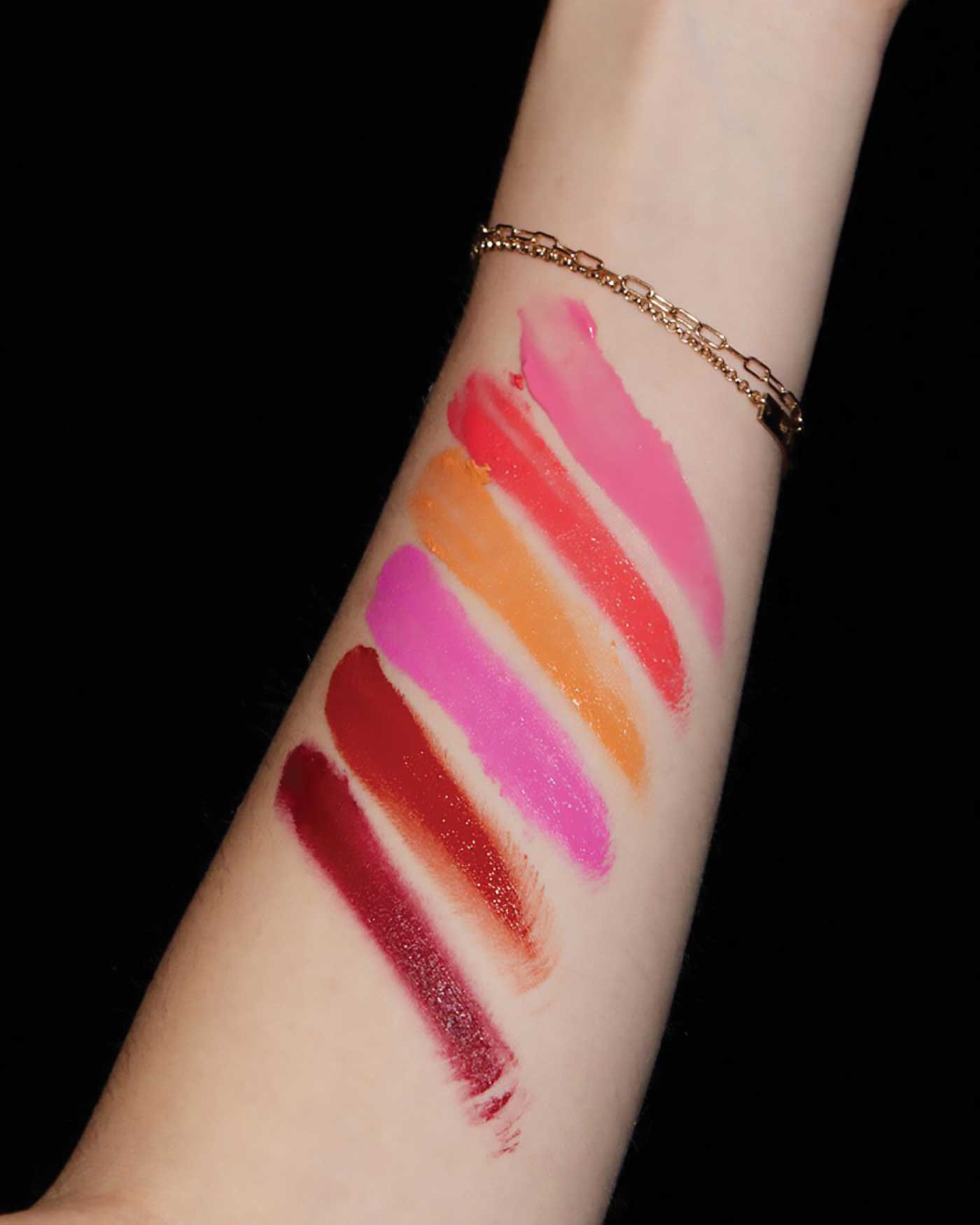 Seint Holiday Lip and Cheek Swatches on an arm