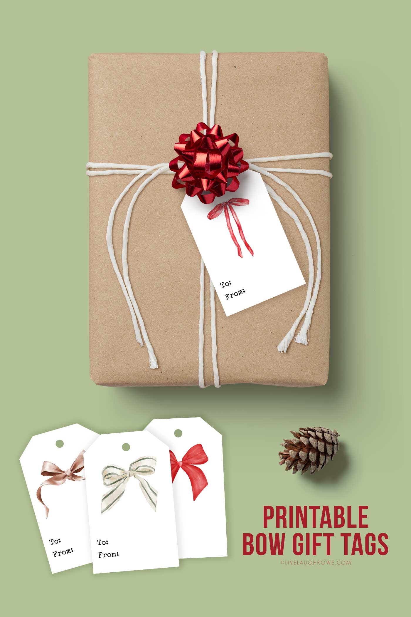 gift wrapped in kraft paper with white twine and a red foil bow with bow gift tags and a pinecone