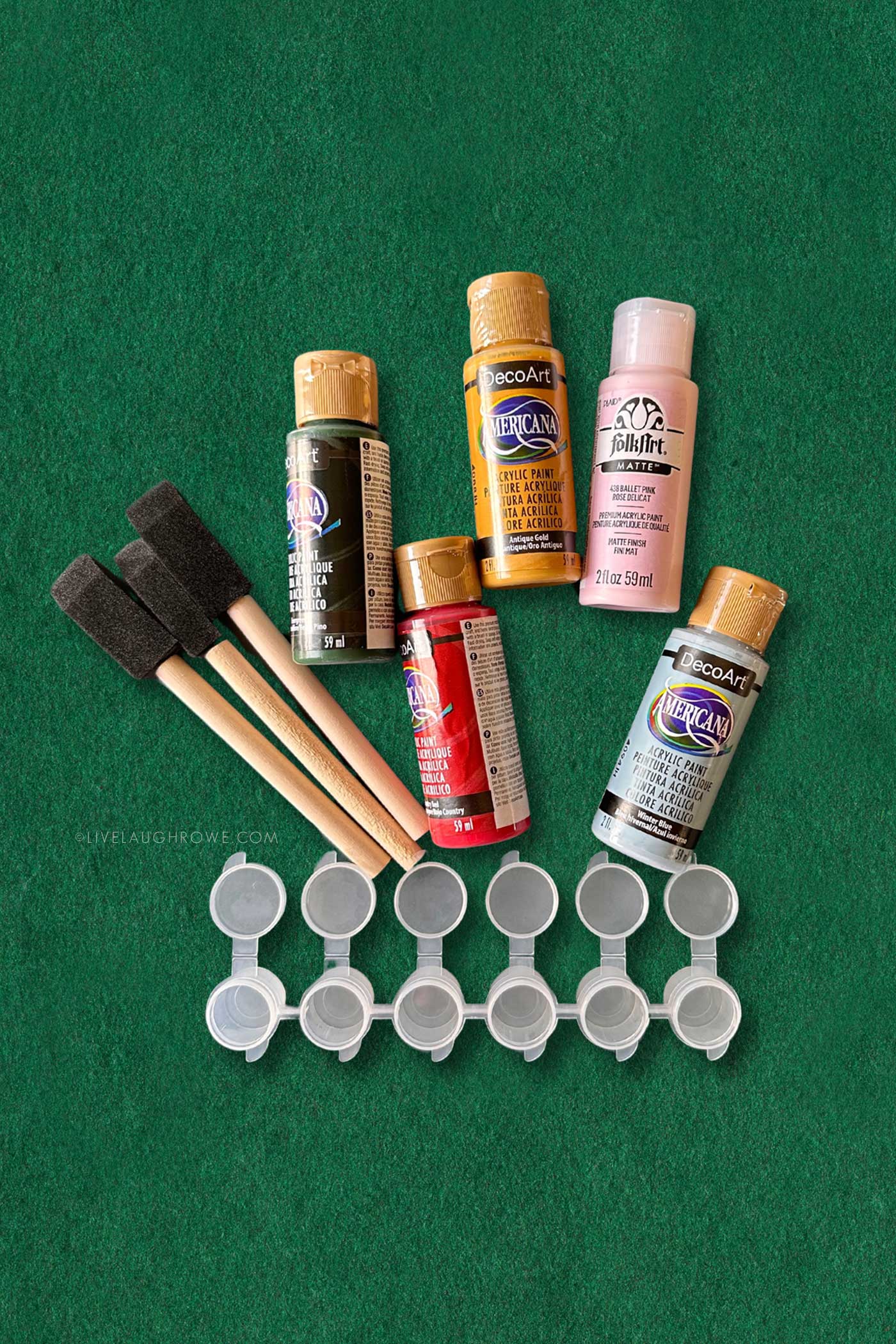 supplies for holiday craft for kids. sponge brushes, acrylic paint and paint pots