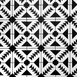 black and white floor tiles with a beautiful design