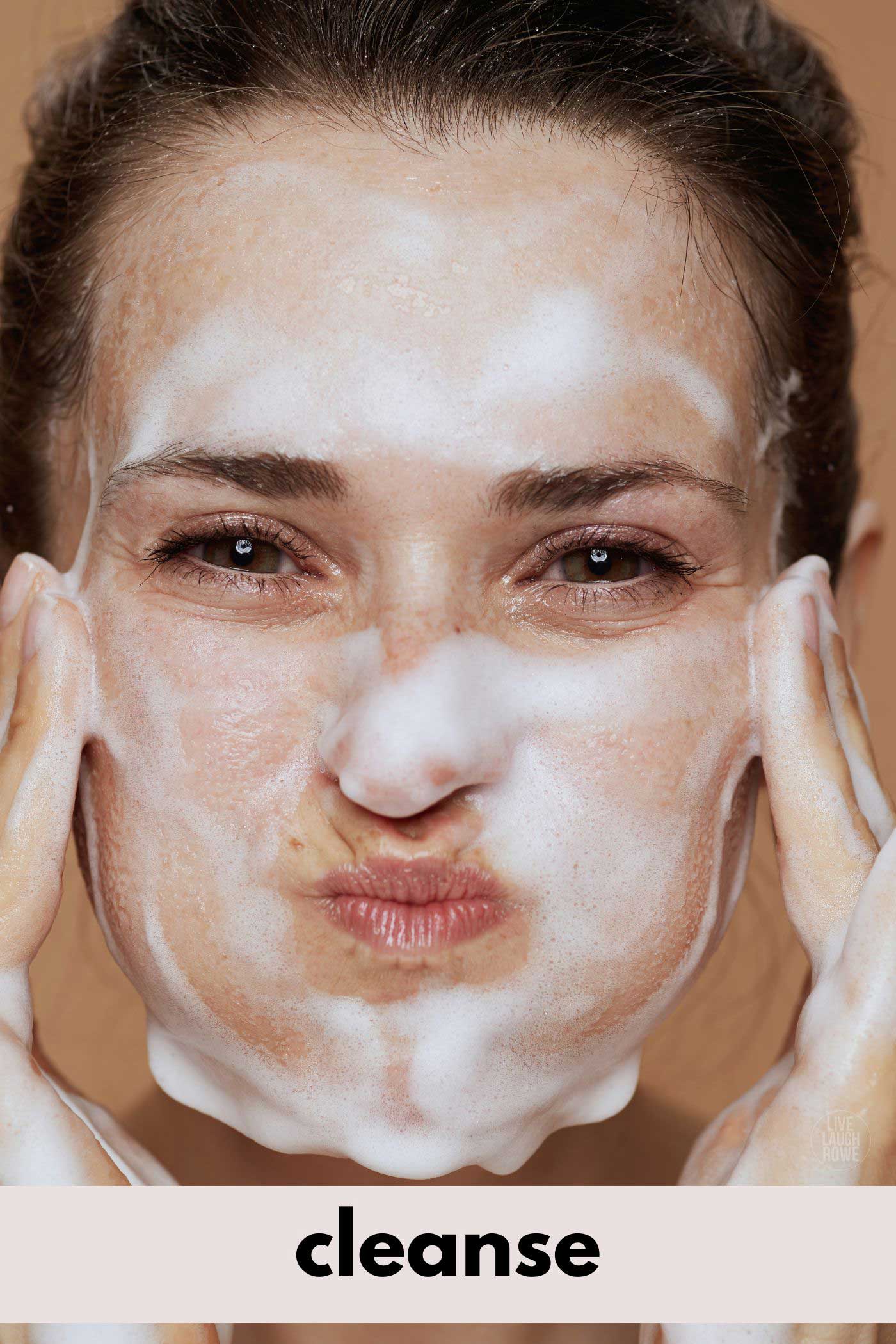 womans face full of cleanser demonstrating winter skin care tips