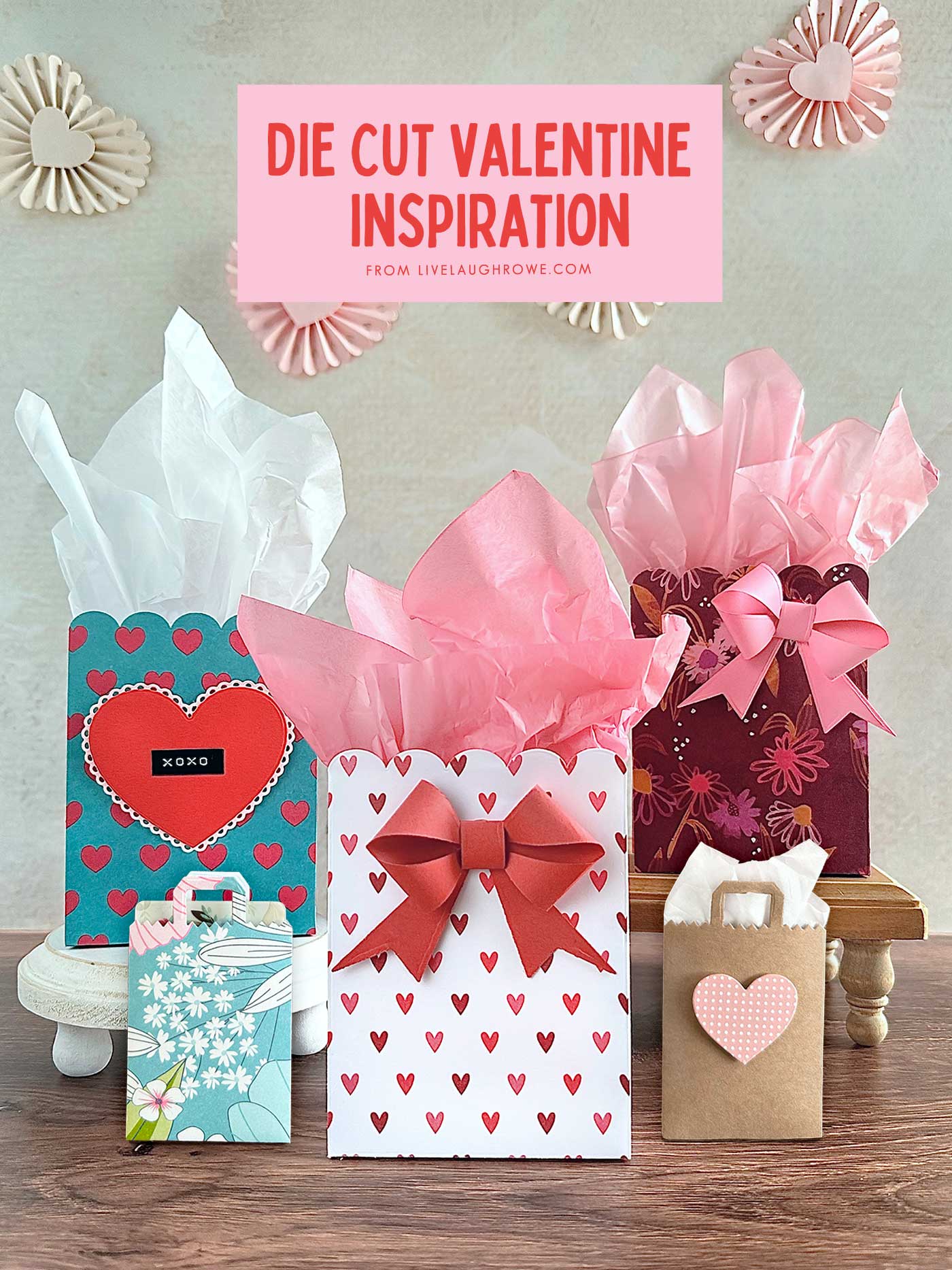 valentine's day inspiration using different paper crafts styled that include scalloped gift bags, gift card holders and rosette garland