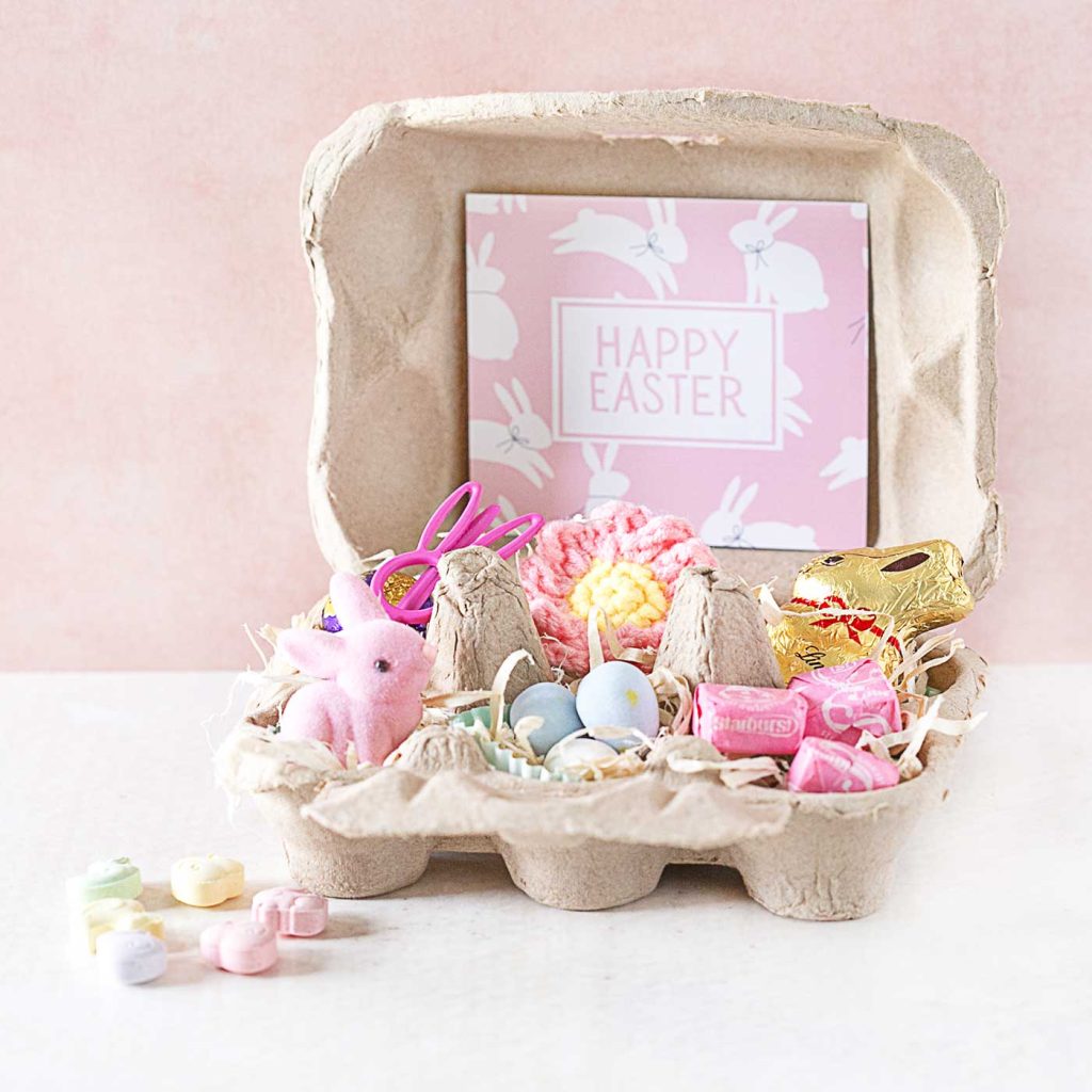 pink-themed egg carton Easter basket with a gift tag