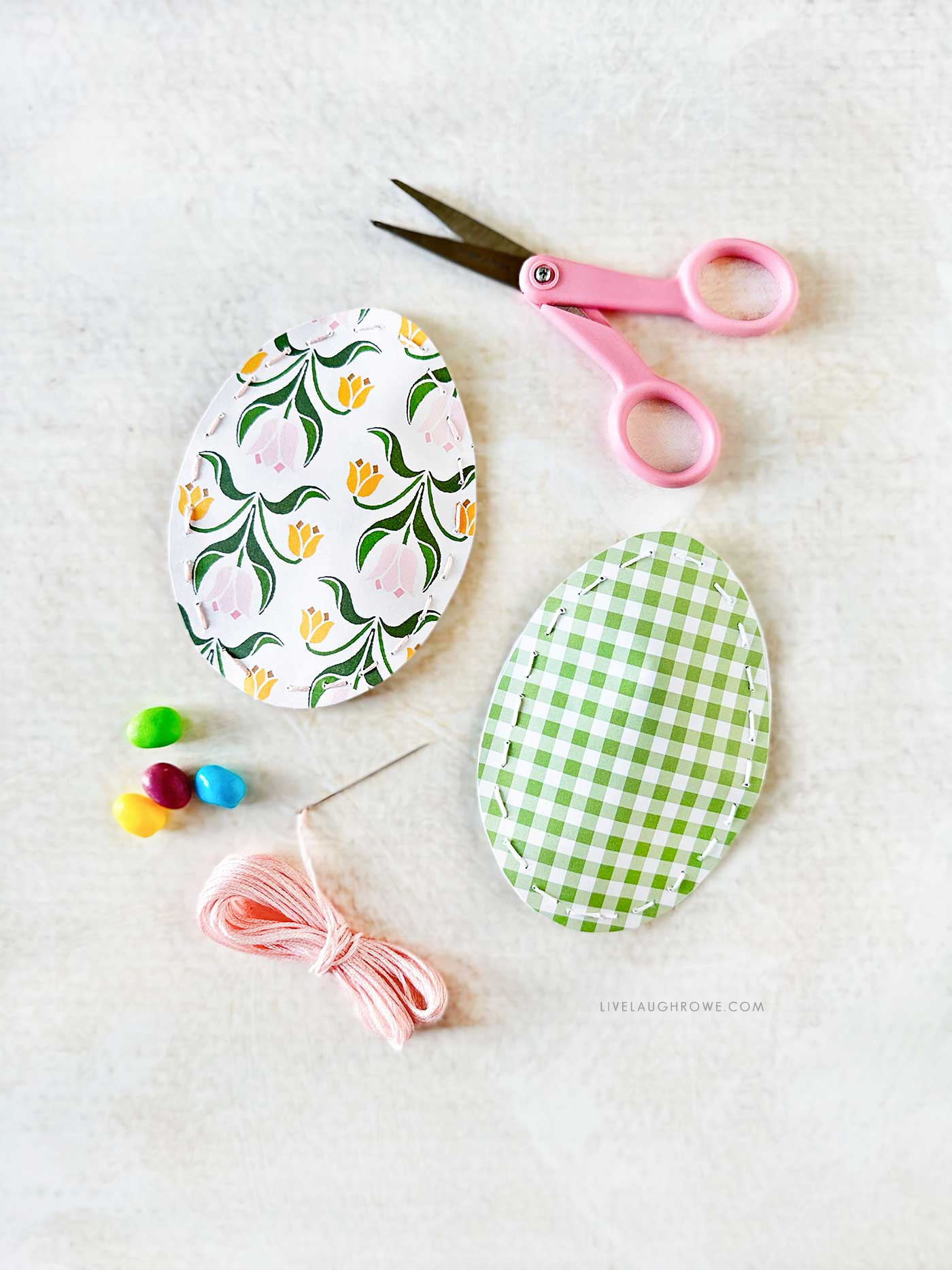 paper eggs that were hand sewn using embroidery floss.