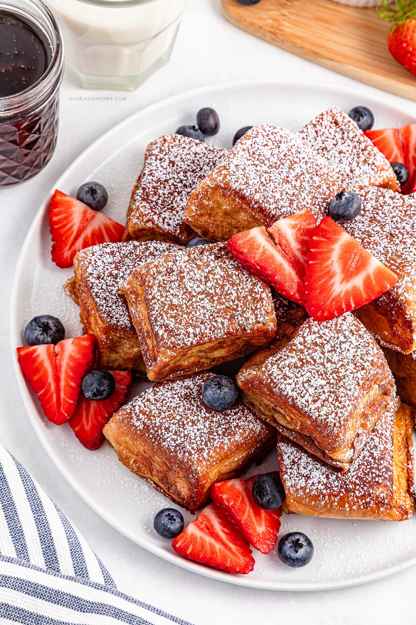 Mini French toast bites made from King’s Hawaiian rolls, stacked and ready to serve.
