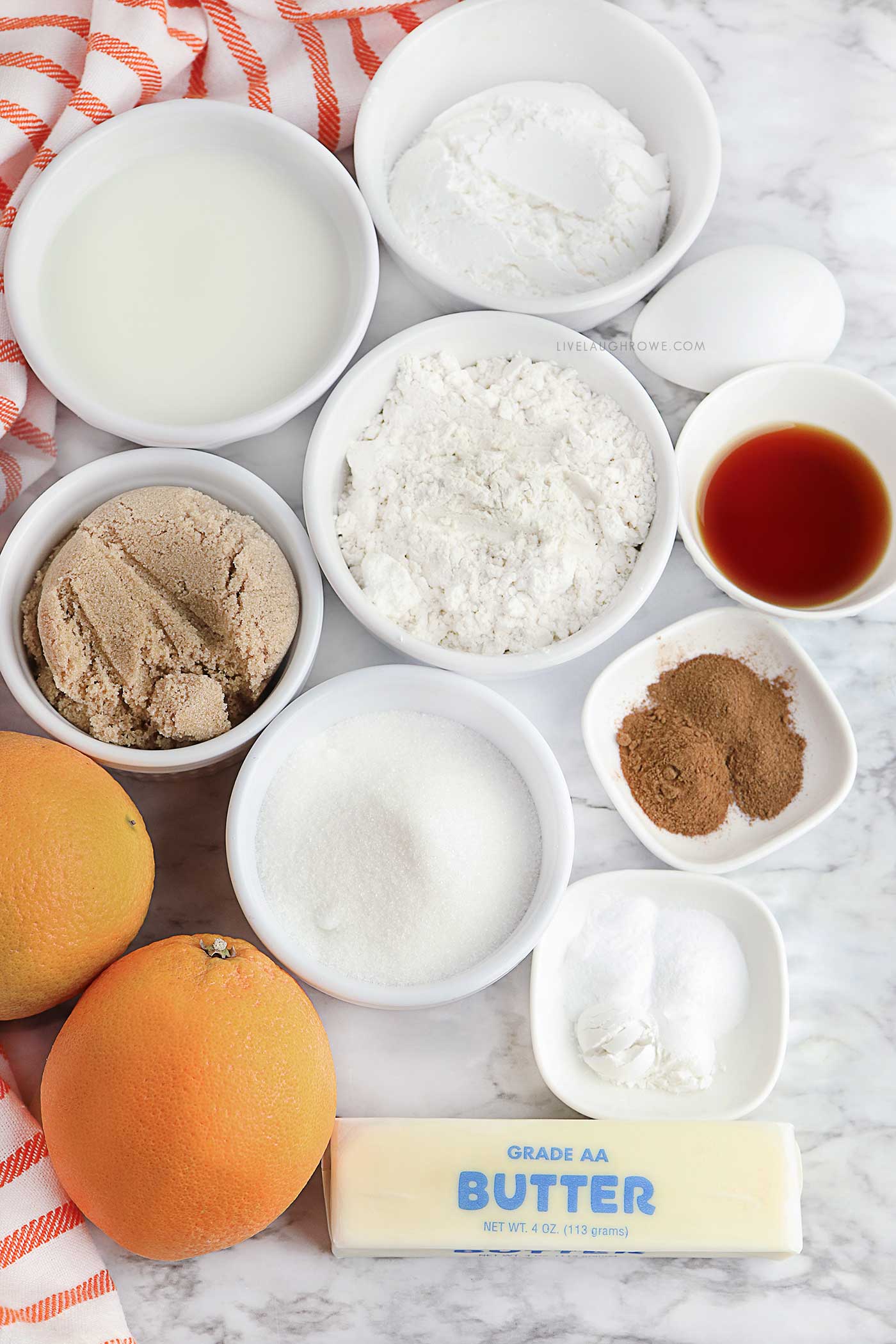 a grouping of different ingredients for a citrus and spice donut recipe