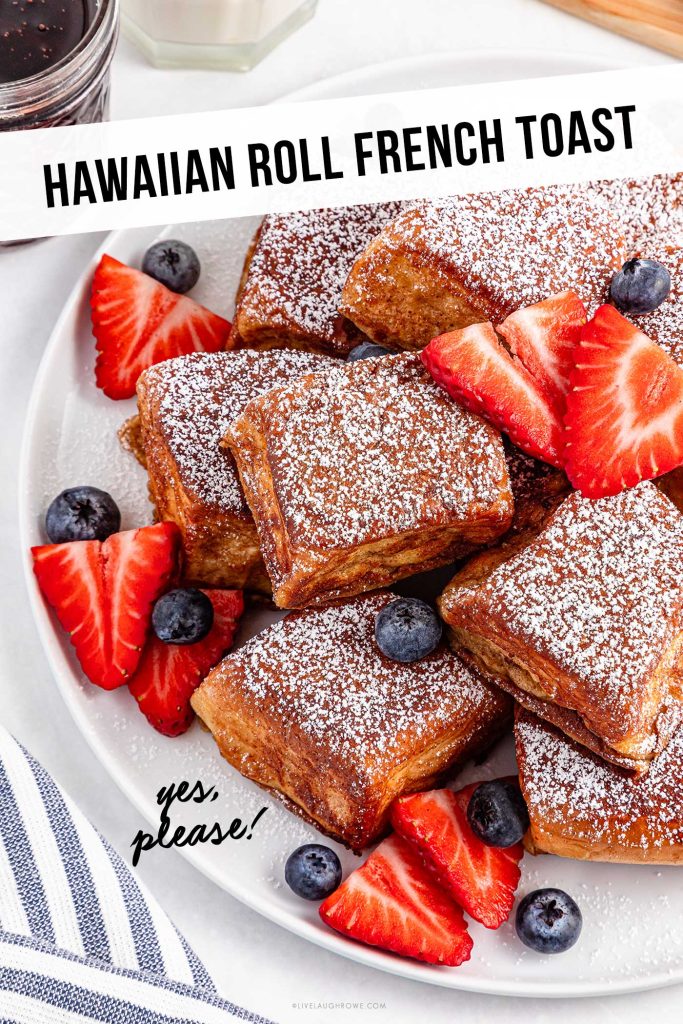 French Toast bites dusted with powdered sugar and served with maple syrup.