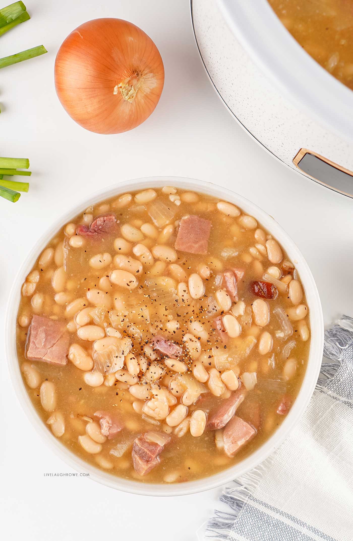 soup served in a white bowl with simple garnishes