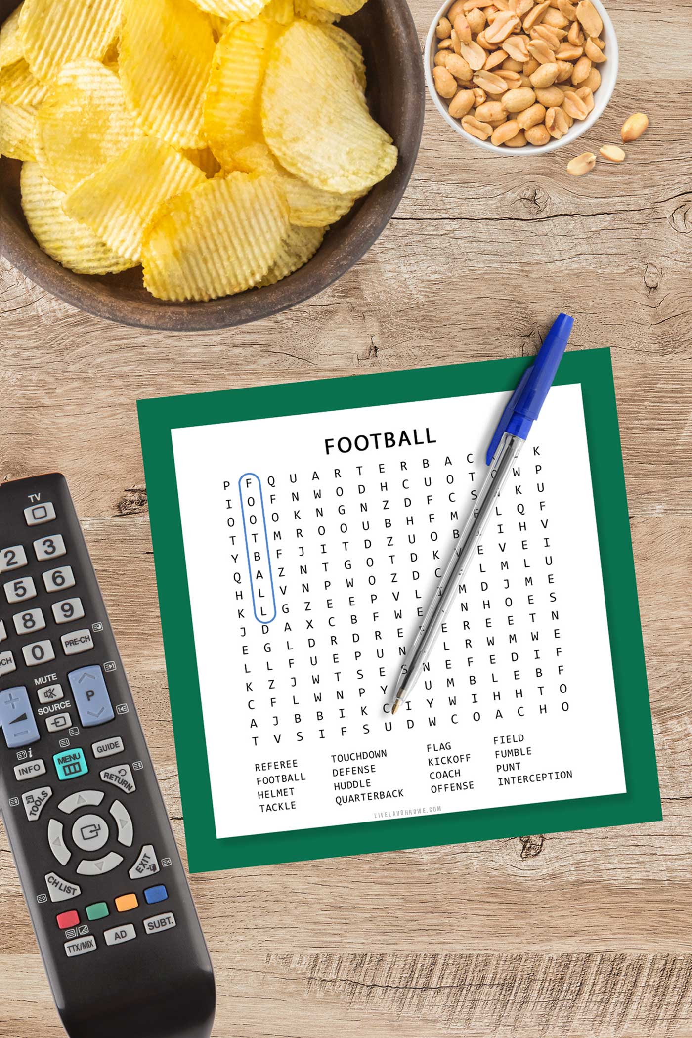 Football-themed word search printable displayed with snacks and drinks on game day