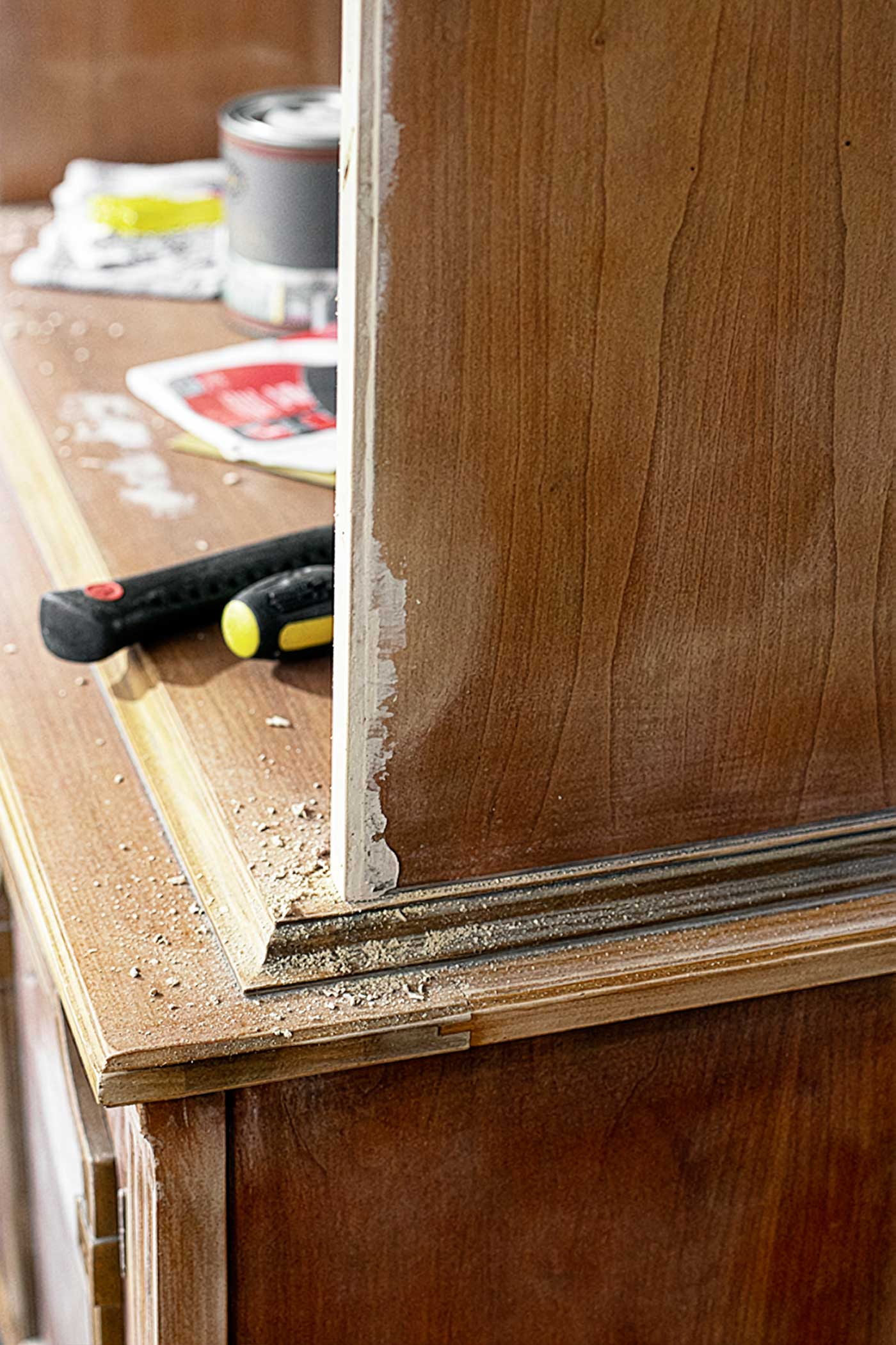 hutch with tools on it as it's getting a makeover