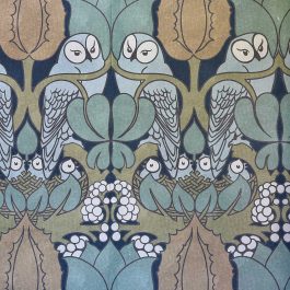 Close-up view of decorative owl wallpaper showcasing detailed feathers, floral accents, and muted blue-green color palettes.