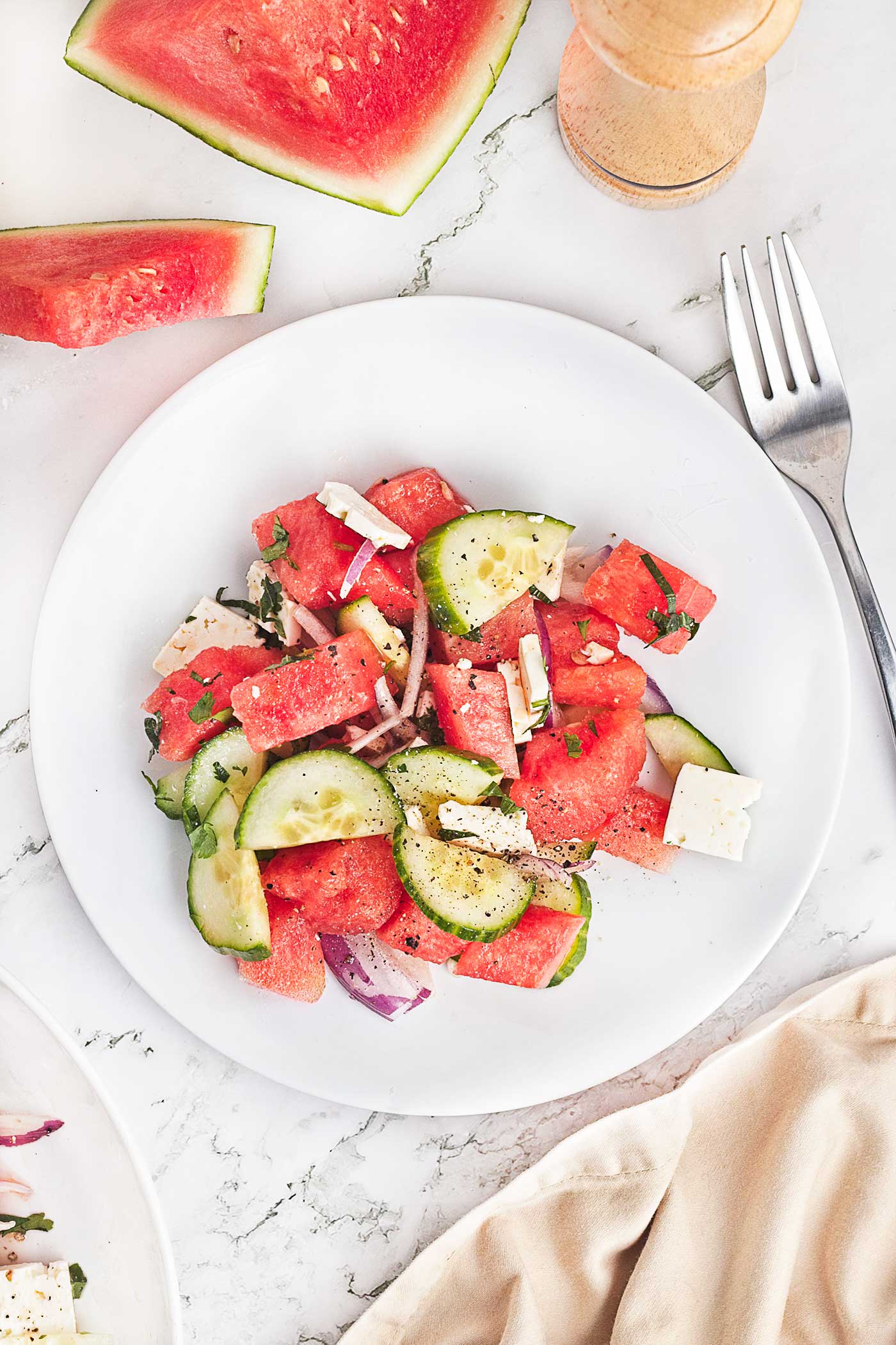 Plate of fresh no-cook salad with watermelon