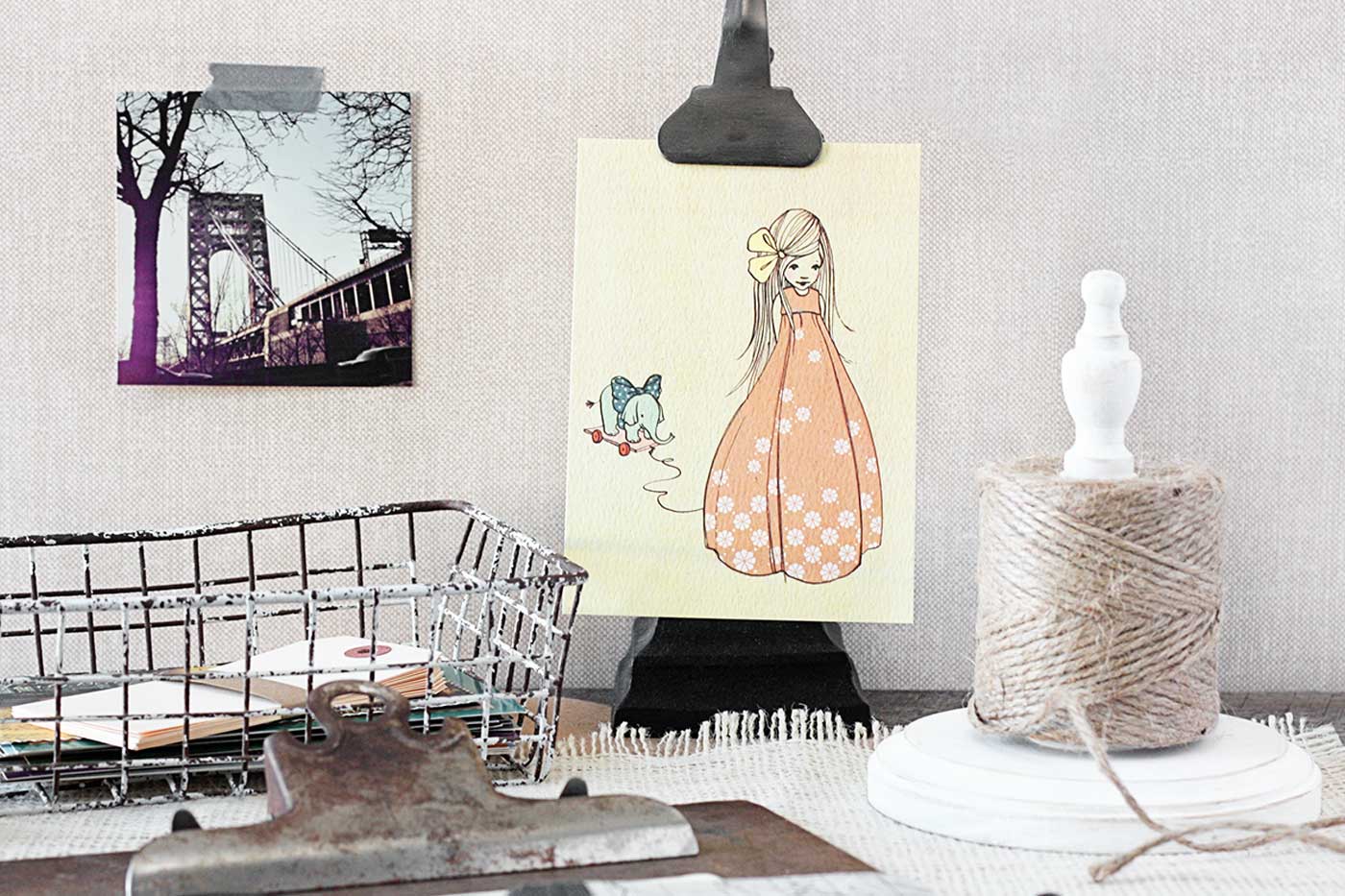 DIY project with wooden twine holder with natural jute twine displayed on a craft table
